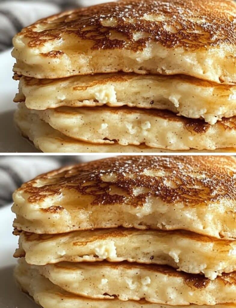 Pila de hotcakes esponjosos de cottage y almendra con toque de canela, cubiertos con miel.